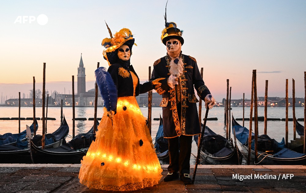 people in traditional carnival costume in Venice, Italy